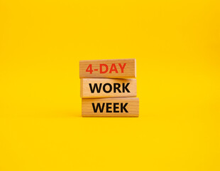 Naklejka premium 4-day work week symbol. Concept words 4-day work week on wooden blocks. Beautiful yellow background. Business and 4-day work week concept. Copy space