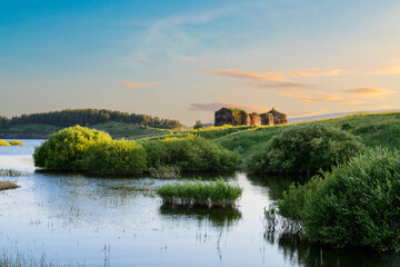 Beautiful panoramic landscape sunset over the river and hills.