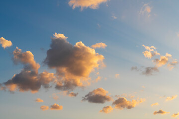 Beautiful bright sunrise with clouds. Sky background.