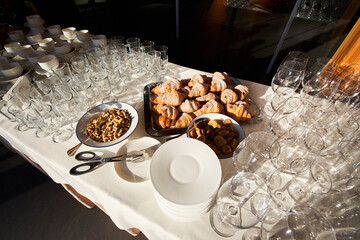 Sweet bagels and nuts at the morning coffee break on the catering