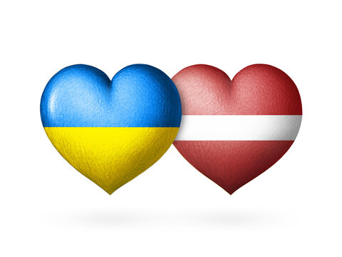 Two flag heart. Flags of Ukraine and Latvia. Two hearts in the colors of the flags isolated on a white background. Protection, solidarity and help.
