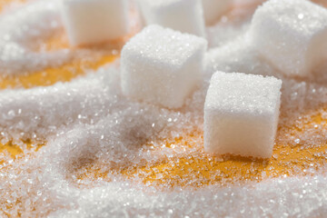Fototapeta na wymiar Sugar cubes close up. Background of refined cane sugar