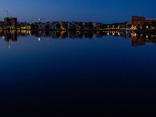 Fototapeta premium night view of the city of stockholm at hammarby sjöstad