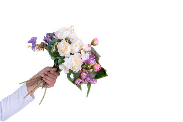 Detail of hands holding a bouquet of flowers isolated on white background, gift concept for mother's day