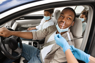 African American Man Getting Tested For Coronavirus In Car