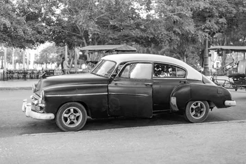 Fototapeten black and white of classic car in havana cuba © Michael Barkmann