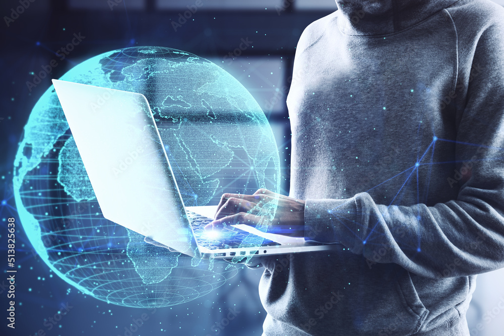 Poster hacker hands using laptop with creative glowing polygonal grid planet on blurry office interior back