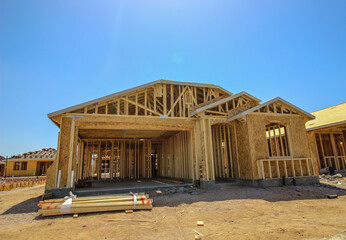 Framing Stage Of New Home Under Construction