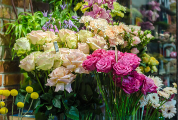 Bouquets of flowers on the window of a flower shop
