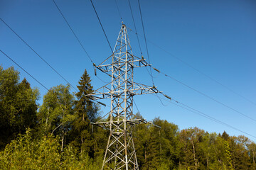 Electric tower. Electric transmission line. High voltage.