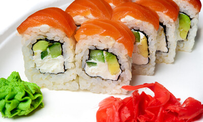 Sushi on a plate. Japanese cuisine - roll set on a white background.