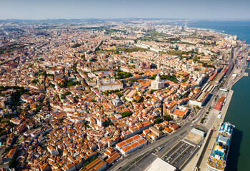 Fototapeta na wymiar Aerial view of oldest district Alfama overlooking National Pantheon and Monastery of Sao Vicente de Fora, Lisbon, Portugal