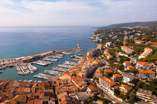 Aerial photo of Cassis, South of France. Cassis Harbour and Mediterranean coast visible from above.