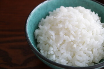 bowl of rice with chopsticks