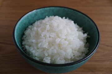 bowl of rice on black background