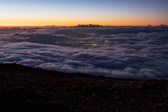 Haleakala Twilight Above The Clouds And City Lights Below