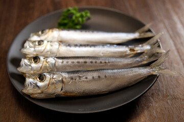 Squid that is the ingredient for multiple freshly caught fish dishes on the table
