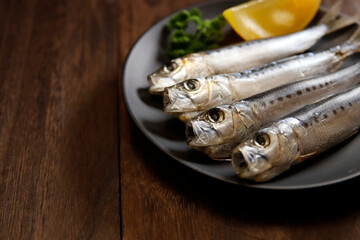 Squid that is the ingredient for multiple freshly caught fish dishes on the table
