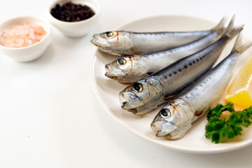 Squid that is the ingredient for multiple freshly caught fish dishes on the table
