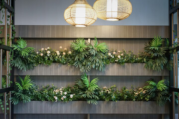 Plant moss grass fern and green leaves decoration hanging on a wall Interior design of retro living...