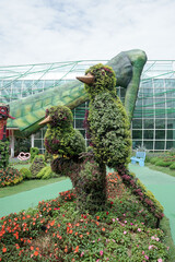 Green sculptures topiary garden created from artificial grass - gardens topiary. Creative idea for...