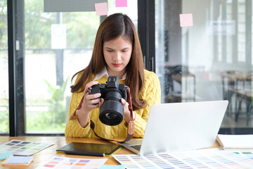 Young Asian Graphic Designer Working on Computer.