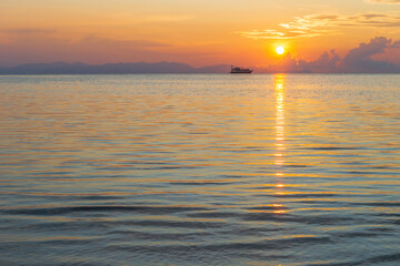 Beach and sea view on Lipe island, Satun Province, Thailand, andaman sea where you can watch the sunrise and sunset on the same beach.