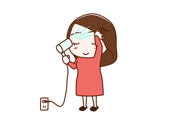 （全身斜め）ドライヤーで髪を乾かしたり整える女性