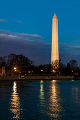 Fototapeta na wymiar The Washington Monument reflecting at a pool at night in Washington DC.