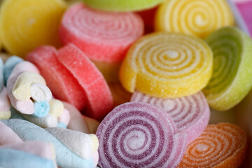 Fototapeta na wymiar Multi-colored FRUIT FLAVOUR fluffy marshmallows, Tasty, Colorful Marshmallows.