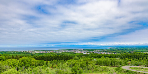 Panoramic view of Abashiri City from the Mount Tento, a Place of Scenic Beauty of Japan, in Hokkaido.