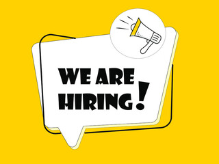 Megaphone with We are hiring speech bubble on yellow background.