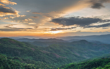 Colorful sunset over the mountain hills Thailand.