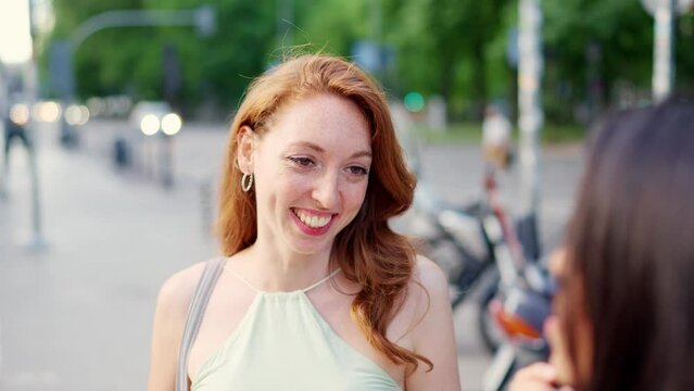 Best friends talking about personal things outdoors