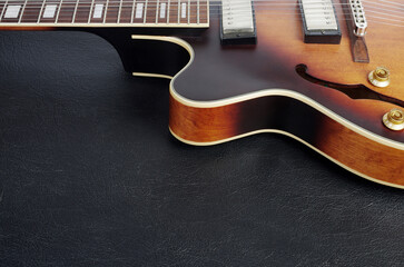 Obraz na płótnie Canvas Jazz electric guitar on a dark background. Close up.