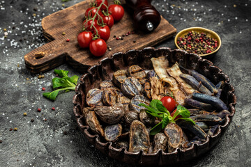 Fried potatoes, Baked purple sweet potatoes with bacon on a metal tray, banner, menu, recipe place for text, top view