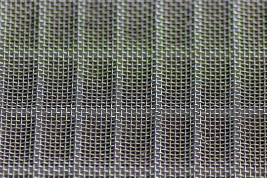 Solid metal mesh over metal grid as solid filter for particles in heavy industry products for durability