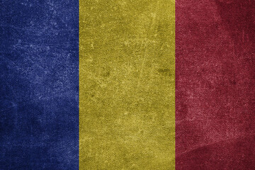 Old leather shabby background in colors of national flag. Chad