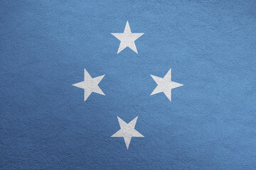 Modern shine leather background in colors of national flag. Micronesia