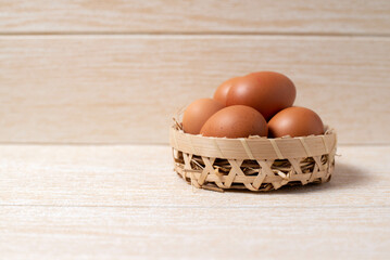 egg in wood background and copy space