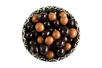 Chocolate covered hazelnuts.  Chocolate balls