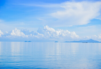 Beautiful seascape ocean horizon and blue sky at Summer season. Travel and Summer vacation in Thailand. Beautiful seascape background concept and empty space.
