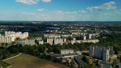 Tranquil suburbs in a big city. Multi-storey buildings and a large green area. Panoramic photo. Aerial photography.