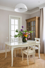 Vase with beautiful magnificent bouquet on the table
