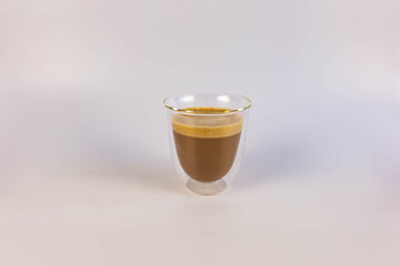 Double wall coffee glass tumbler with poured coffee, side view