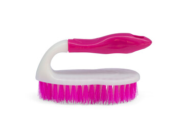 Pink and white plastic brush for cleaning and clothes clearing with handle isolated on white background included clipping path.