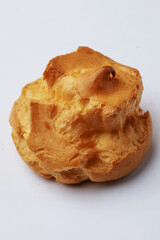 Profiteroles on white background in studio