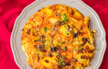 Traditional spanish tortilla on a white plate