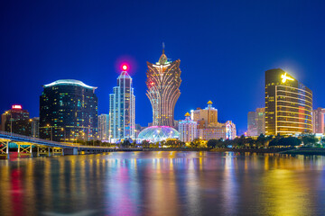 skyline of macau by the sea at night in china