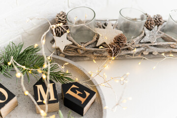 Sweet home. White Christmas decor on vintage natural wooden background.